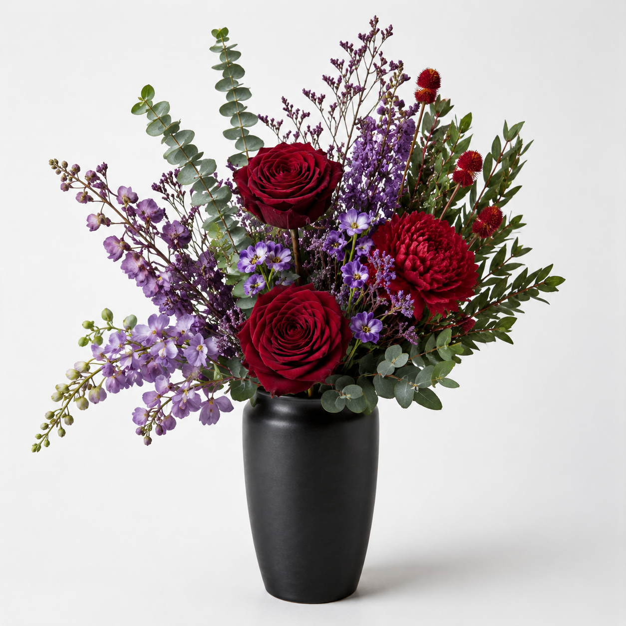 modern garden-style arrangement in a matte black vase style floral arrangement with Preserved Rose, Red Multi-head Rose,