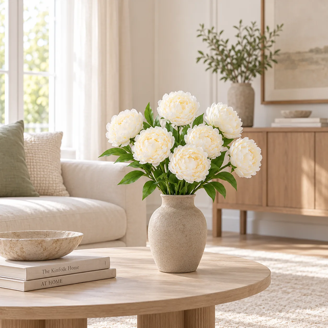 Cream Peony Stems on a dining table