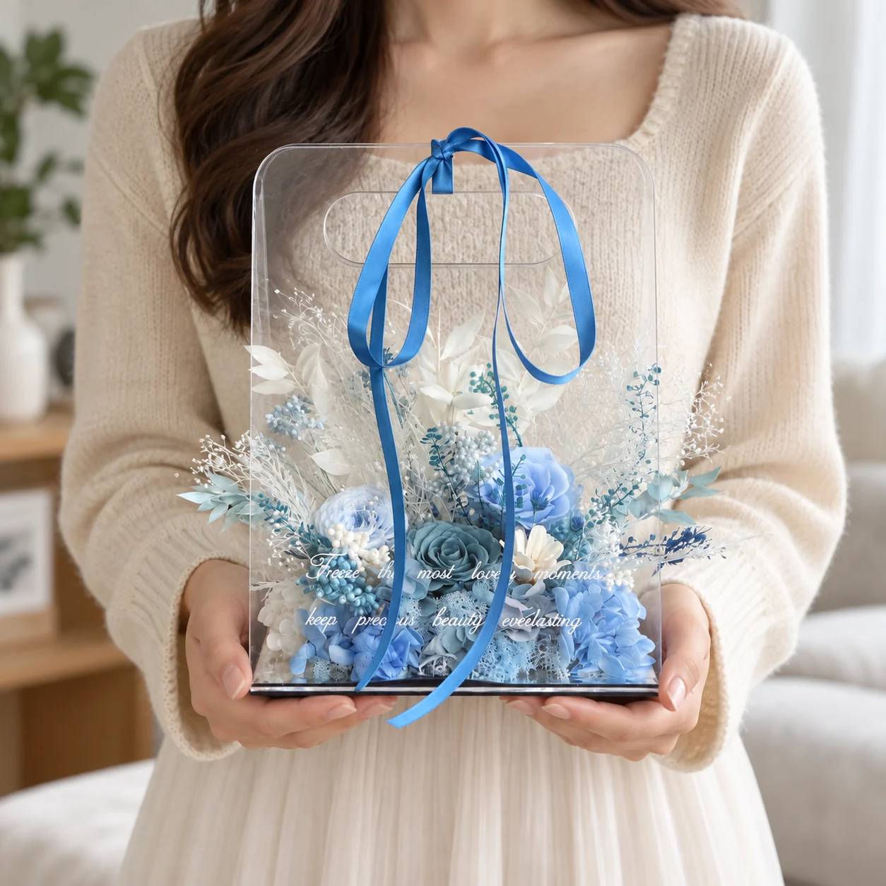 Ocean Blue Acrylic Tote Flower Box on a desk