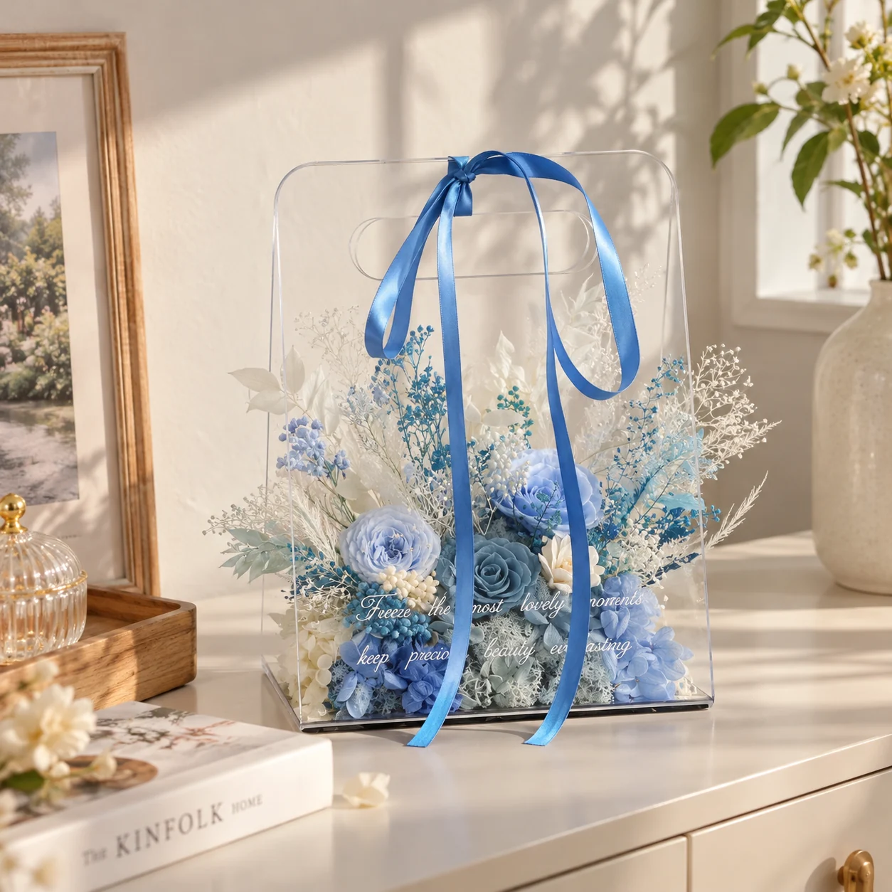 Ocean Blue Acrylic Tote Flower Box on a desk